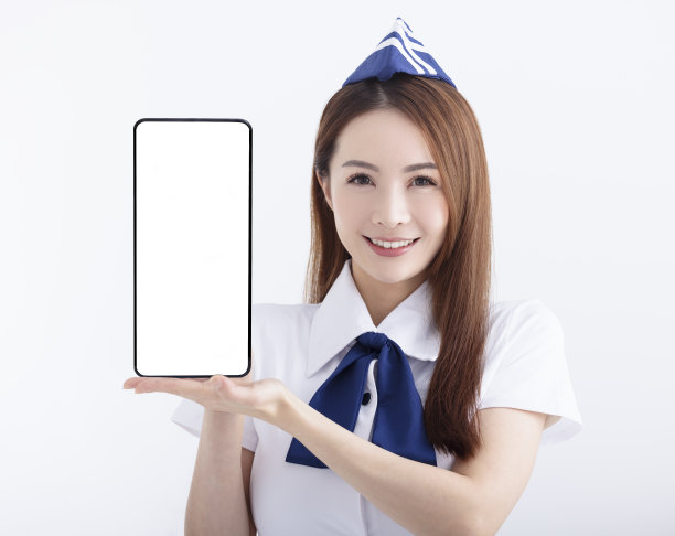 美丽的空姐展示白底空白屏幕的手机图片下载