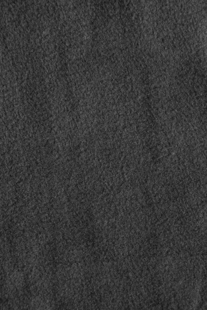 温暖的羊毛织物的质地。灰色毛毡背景。图片下载