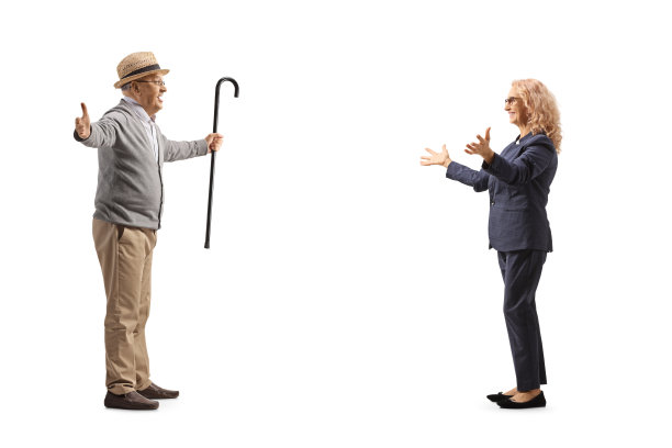 一个年长的绅士会见一个成熟的女人的完整长度的侧面拍摄图片下载