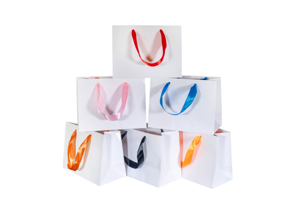 可回收的工艺纸袋购物，礼物和外卖食品模拟在白色背景。比一次性塑料袋更环保图片下载