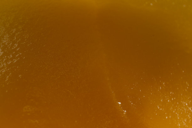 蜜汁橙色纹理背景，特写宏观视图图片下载