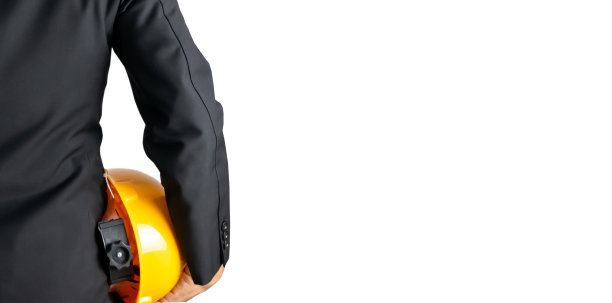 工程师穿着西装，拿着头盔，概念和复制空间图片下载