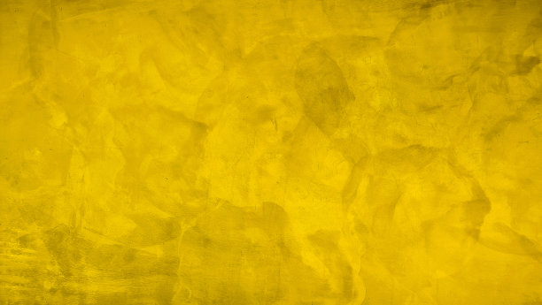 黄色空灰泥水泥编辑文本目前在自由空间背景。黄色灰泥混凝土墙，建筑外露灰泥混凝土墙作为复古概念设计的背景。图片下载