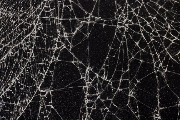 玻璃破碎成大量碎片和裂缝图片下载