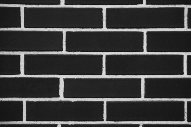 黑白背景来自砖墙纹理。设计师背景图片下载