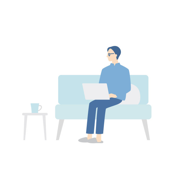 坐在沙发上用笔记本电脑工作的女商人图片下载