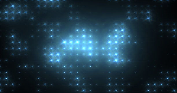 抽象循环发光黄橙亮迪斯科墙与灯泡抽象的背景图片下载