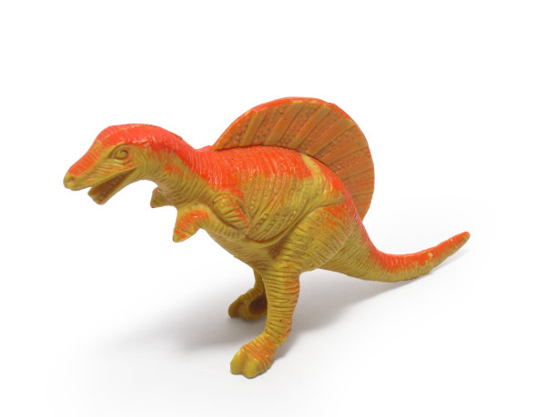 橙色恐龙玩具被隔离图片下载