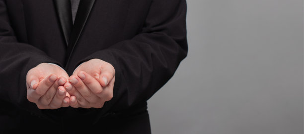 商人的手灰色背景。通信，技术，物联网，互联网，全球，网络，未来概念图片下载