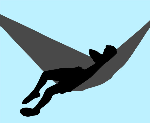 一个男孩在吊床上睡觉的剪影图片下载