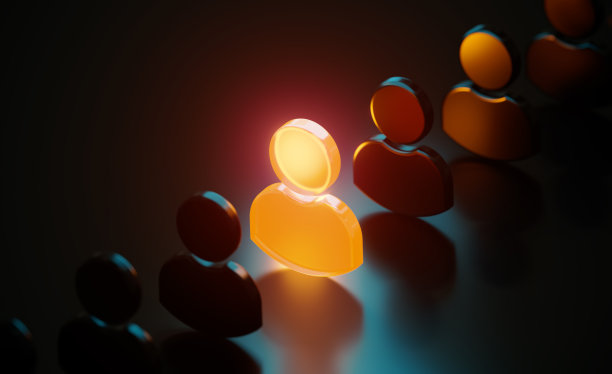 在黑色背景上，在黑色人类符号中发光的橙色人类符号图片下载