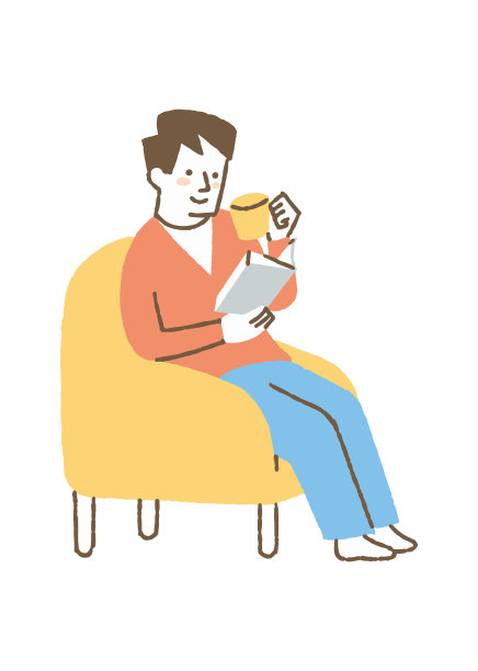 一个男人坐在沙发上看书图片下载