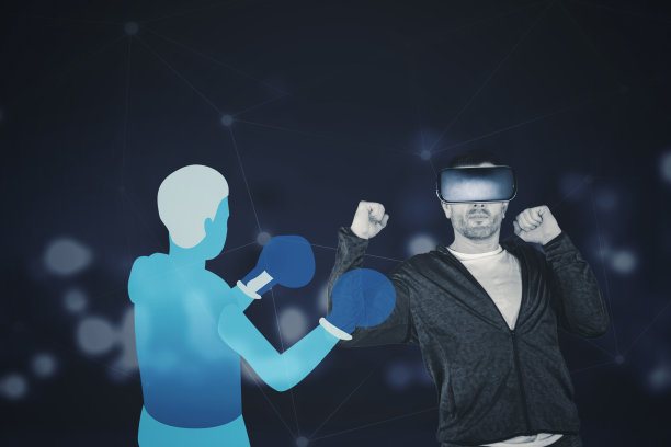 一个人戴着VR眼镜在虚拟世界里练拳击图片下载