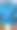 手工编织产品。汽油色的彩色线编织织物。棕色的背景。图片下载