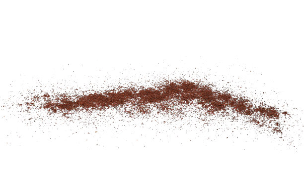 咖啡粉散落在白色的背景上图片下载