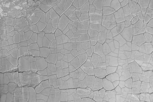 湖底破碎的湿土的结构，创造了不规则的图案，结构，背景。在一个没有水的湖底，大自然创造了令人惊叹的形状图片下载