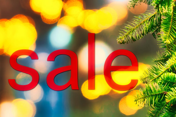 晚上的促销标志和圣诞灯图片下载