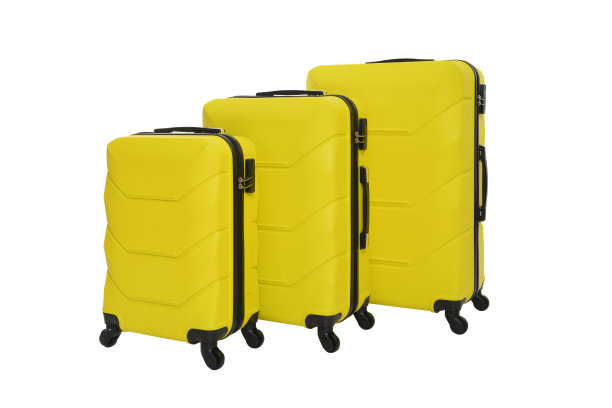 白色背景的黄色旅行箱图片下载