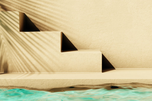 热带夏季背景与混凝土墙，池水和棕榈叶的阴影图片下载