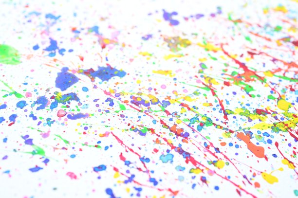 水彩溅在白纸上，五彩缤纷的艺术设计图片下载