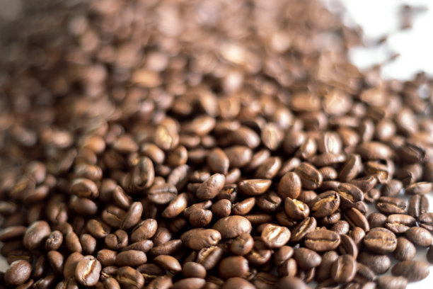 烘焙咖啡豆背景哥伦比亚咖啡粗咖啡图片下载
