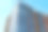 现代豪华公寓楼。现代公寓大楼的正面。蓝天为背景图片下载