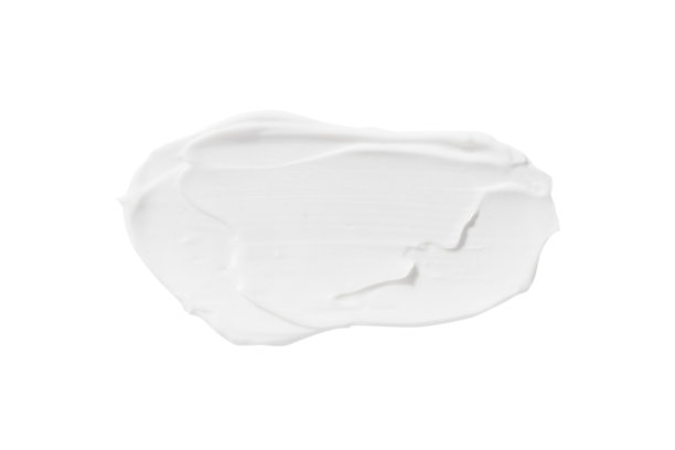 在白色的背景上涂上一层没有阴影的白色化妆霜。孤立。图片下载