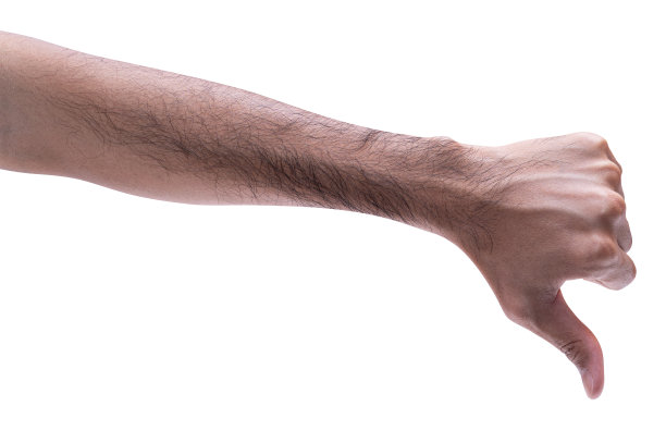 男性拇指朝下的手势被隔离在白色背景上。图片下载