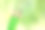 三尖的绿色木制铅笔在模糊的自然背景与散景图片下载