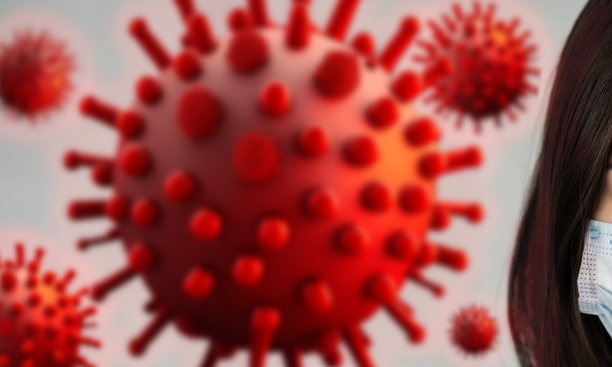 女孩和病毒，微生物，细菌。一张戴医用口罩的脸和一个会飞的病毒模型。图片下载