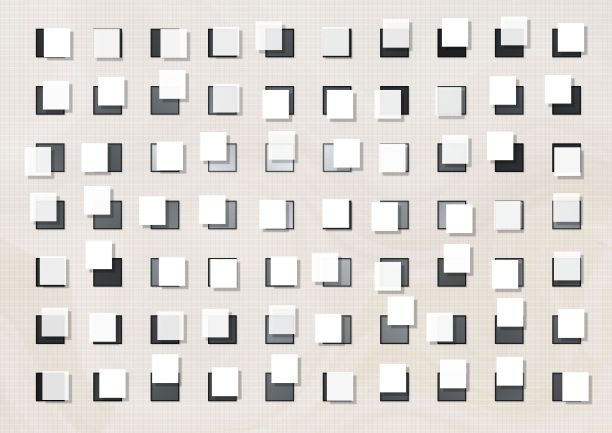 黑色、白色和灰色方块在白色背景上随机排列图片下载