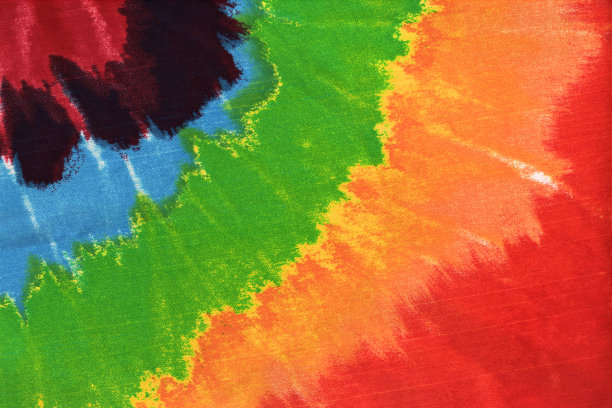 红色，绿色，黄色，橙色，蓝色，棕色扎染图案充满活力的抽象平面设计或壁纸或背景图片下载