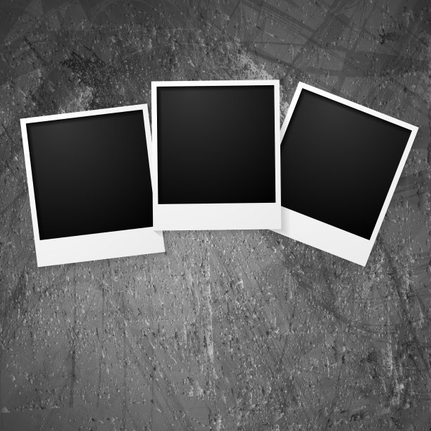 垃圾墙上的宝丽来相框图片下载