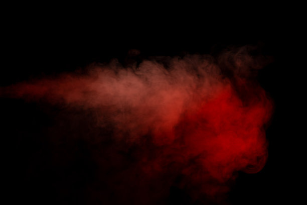橙色和红色的蒸汽在黑色的背景。图片下载
