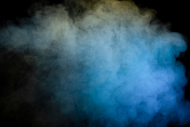 蓝色和黄色蒸汽在黑色的背景。图片下载