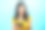 长头发的亚洲美女“肖像”，手持信用卡在笔记本电脑上用支付商品进行网上订购，蓝色背景的室内工作室与世隔绝。图片下载