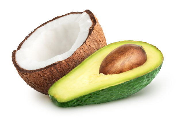 孤立的水果。一半的鳄梨和一半的椰子孤立在白色的背景与剪辑路径图片下载