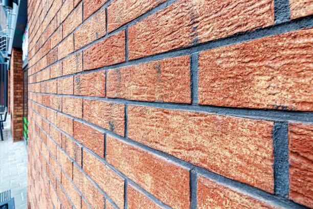 装饰砖。墙壁由老式砖砌成图片下载