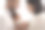 新生儿的家庭。幸福的父母抱着孩子。微笑的母亲看着婴儿在白色孤立的背景。儿童保育与健康图片下载
