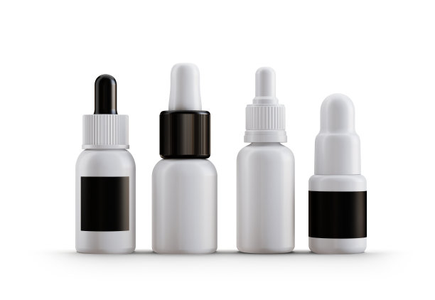 空白滴瓶模型与白色的帽子图片下载