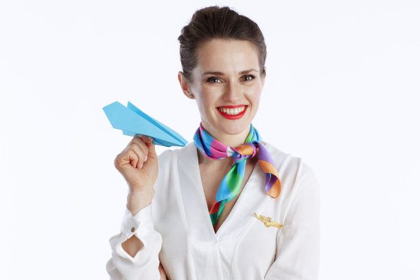 穿着白色衣服微笑的时尚空姐图片下载