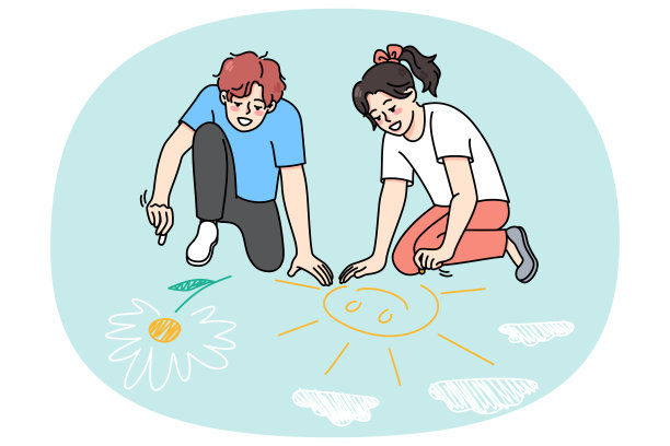 快乐的孩子们用粉笔在沥青上画画图片下载