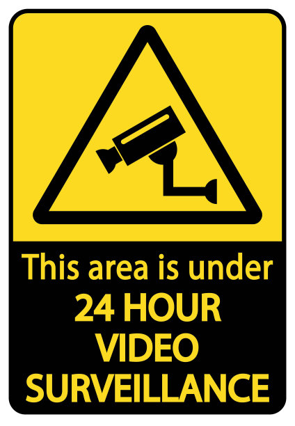 这片区域有视频监控。黄色三角形警示标志。图片下载