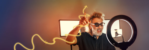 电台主持人，帅气的网红，用器材录制现场节目。图片下载