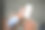 一名亚洲男子坐在房间里使用智能手机的特写照片。图片下载
