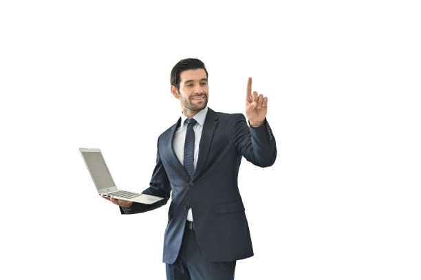 一个商人在办公室工作到很晚的时候使用笔记本电脑图片下载