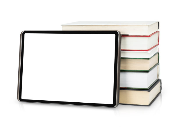 数字平板电脑与书籍隔离在白色图片下载