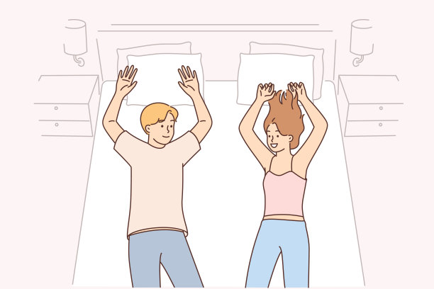 一对幸福的夫妇在入住昂贵的酒店后躺在床上享受期待已久的假期图片下载