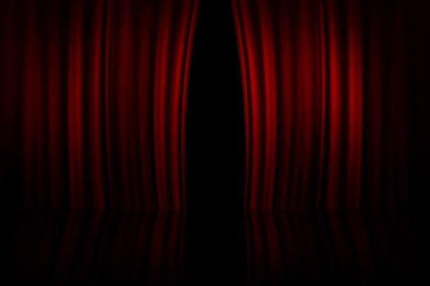 剧院或电影院舞台上的红色幕布微微打开图片下载