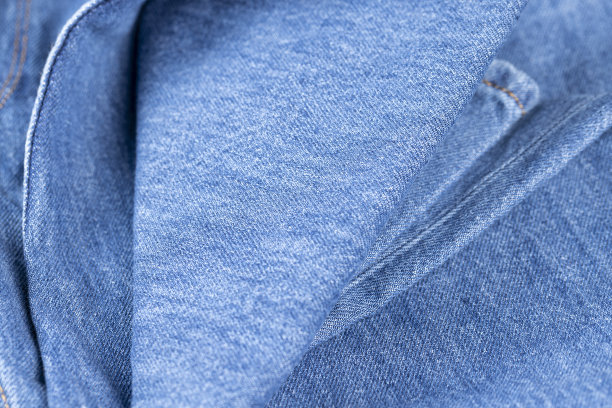 一种新的蓝色牛仔布的特写图片下载